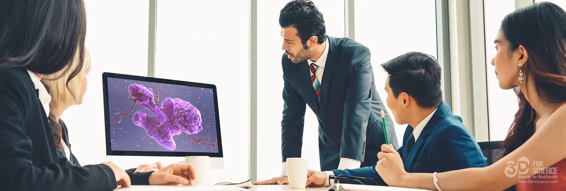 man in a meeting watching a medical animation